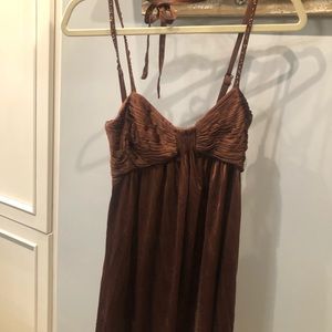 Sexy, brown, mini dress, comfortable, flowy, flatters the legs and chest.